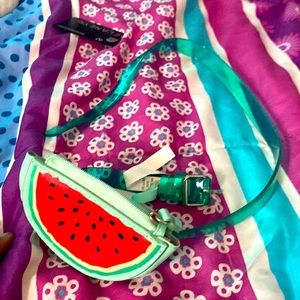 I am selling a belt with a little tiny purse to keep your money